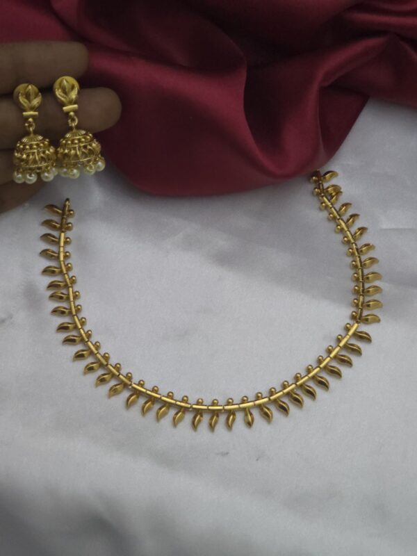 Premium matt arumbu necklace with pearls hanging jhumka
