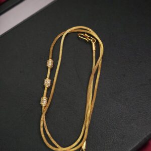 real gold tone cylinder type mugappu chain
