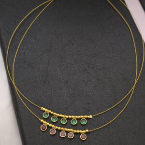 Premium gold polished ad invisible necklace ruby and emerald